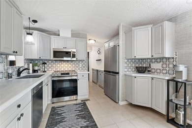 MOVE-IN Condition Furnished 2/2 Park Model on OWNED land with on Deer Creek RV Golf Resort in Florida - for sale on GolfHomes.com, golf home, golf lot