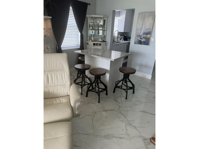 Beautifully Upgraded 2nd floor 2bedroom 2 Bath condo. Corner on Leisureville Community Association in Florida - for sale on GolfHomes.com, golf home, golf lot