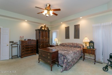 Enjoy elegant golf course living at its best in this impressive on Pinewild Country Club of Pinehurst in North Carolina - for sale on GolfHomes.com, golf home, golf lot