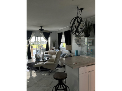 Beautifully Upgraded 2nd floor 2bedroom 2 Bath condo. Corner on Leisureville Community Association in Florida - for sale on GolfHomes.com, golf home, golf lot