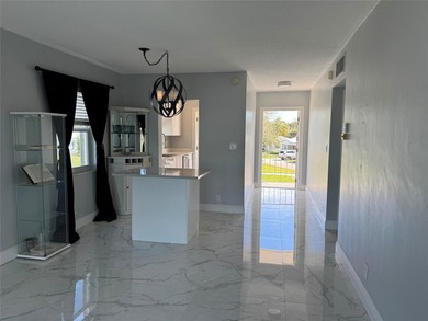 Beautifully Upgraded 2nd floor 2bedroom 2 Bath condo. Corner on Leisureville Community Association in Florida - for sale on GolfHomes.com, golf home, golf lot