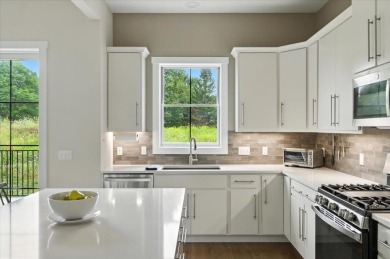 Enjoy refined living in this exquisitely crafted townhome in the on Kwiniaska Golf Club in Vermont - for sale on GolfHomes.com, golf home, golf lot
