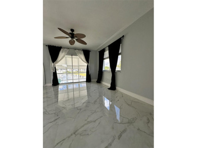 Beautifully Upgraded 2nd floor 2bedroom 2 Bath condo. Corner on Leisureville Community Association in Florida - for sale on GolfHomes.com, golf home, golf lot