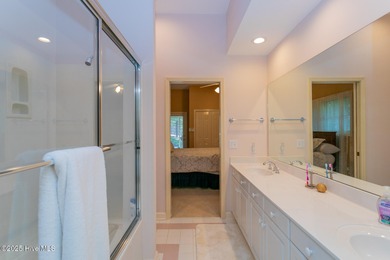 Enjoy elegant golf course living at its best in this impressive on Pinewild Country Club of Pinehurst in North Carolina - for sale on GolfHomes.com, golf home, golf lot