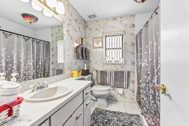 Beautiful 3-bedroom, 2-bath home offering an open layout and on The Grand Club Cypress Course in Florida - for sale on GolfHomes.com, golf home, golf lot