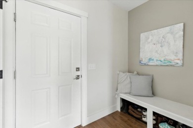 Enjoy refined living in this exquisitely crafted townhome in the on Kwiniaska Golf Club in Vermont - for sale on GolfHomes.com, golf home, golf lot