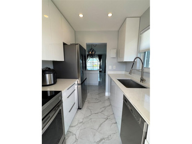 Beautifully Upgraded 2nd floor 2bedroom 2 Bath condo. Corner on Leisureville Community Association in Florida - for sale on GolfHomes.com, golf home, golf lot