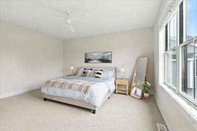 Enjoy refined living in this exquisitely crafted townhome in the on Kwiniaska Golf Club in Vermont - for sale on GolfHomes.com, golf home, golf lot