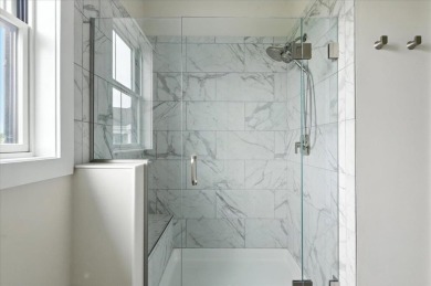 Enjoy refined living in this exquisitely crafted townhome in the on Kwiniaska Golf Club in Vermont - for sale on GolfHomes.com, golf home, golf lot