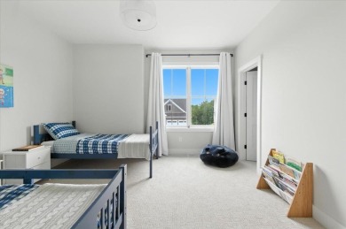 Enjoy refined living in this exquisitely crafted townhome in the on Kwiniaska Golf Club in Vermont - for sale on GolfHomes.com, golf home, golf lot