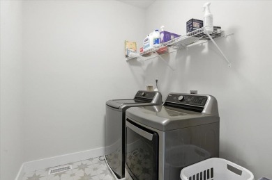 Enjoy refined living in this exquisitely crafted townhome in the on Kwiniaska Golf Club in Vermont - for sale on GolfHomes.com, golf home, golf lot