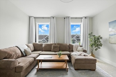 Enjoy refined living in this exquisitely crafted townhome in the on Kwiniaska Golf Club in Vermont - for sale on GolfHomes.com, golf home, golf lot