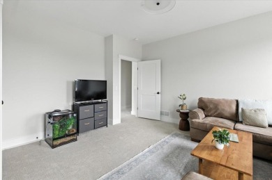 Enjoy refined living in this exquisitely crafted townhome in the on Kwiniaska Golf Club in Vermont - for sale on GolfHomes.com, golf home, golf lot