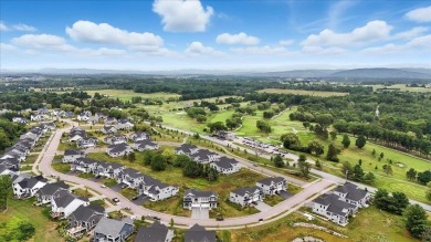 Enjoy refined living in this exquisitely crafted townhome in the on Kwiniaska Golf Club in Vermont - for sale on GolfHomes.com, golf home, golf lot