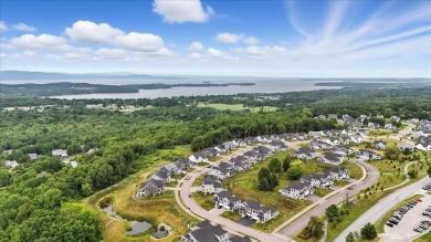 Enjoy refined living in this exquisitely crafted townhome in the on Kwiniaska Golf Club in Vermont - for sale on GolfHomes.com, golf home, golf lot