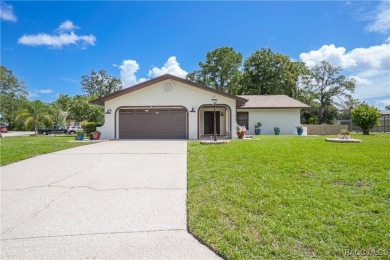 Discover this beautifully maintained 3-bedroom, 2-bathroom home on Sugarmill Woods Golf and Country Club in Florida - for sale on GolfHomes.com, golf home, golf lot