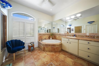 Looking for a stunning waterfront home with breathtaking views on Saint Andrews South Golf Club in Florida - for sale on GolfHomes.com, golf home, golf lot