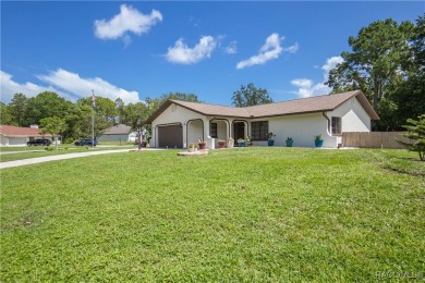 Discover this beautifully maintained 3-bedroom, 2-bathroom home on Sugarmill Woods Golf and Country Club in Florida - for sale on GolfHomes.com, golf home, golf lot