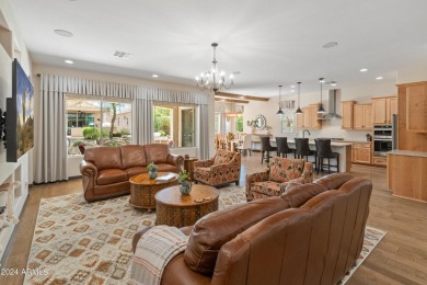 Experience elevated living in this FULLY FURNISHED extended on Copper Canyon Golf Club in Arizona - for sale on GolfHomes.com, golf home, golf lot