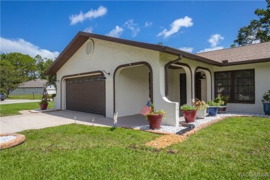 Discover this beautifully maintained 3-bedroom, 2-bathroom home on Sugarmill Woods Golf and Country Club in Florida - for sale on GolfHomes.com, golf home, golf lot