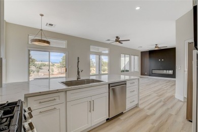Professionally designed Sun City Summerlin view home located ON on Highland Falls Golf Club in Nevada - for sale on GolfHomes.com, golf home, golf lot