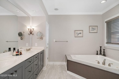 Experience luxury living at its finest in this exquisite on River Landing Golf Course in North Carolina - for sale on GolfHomes.com, golf home, golf lot