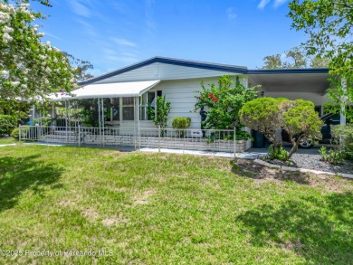 Charming 3 Bedroom, 2 Bathroom Home with 4-Carport in Brookridge on Brookridge Country Club in Florida - for sale on GolfHomes.com, golf home, golf lot