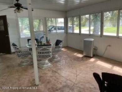 Charming 3 Bedroom, 2 Bathroom Home with 4-Carport in Brookridge on Brookridge Country Club in Florida - for sale on GolfHomes.com, golf home, golf lot