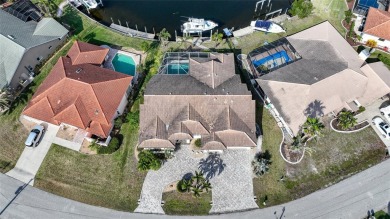 Looking for a stunning waterfront home with breathtaking views on Saint Andrews South Golf Club in Florida - for sale on GolfHomes.com, golf home, golf lot