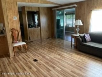 Charming 3 Bedroom, 2 Bathroom Home with 4-Carport in Brookridge on Brookridge Country Club in Florida - for sale on GolfHomes.com, golf home, golf lot