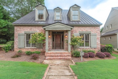 The Carnoustie Cottage is where luxury meets leisure. This on Champions Retreat Golf Club in Georgia - for sale on GolfHomes.com, golf home, golf lot