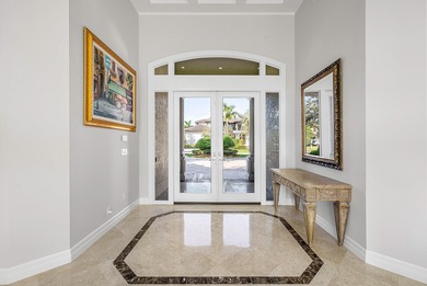 This airy custom built home sits on a half acre lot with on Old Marsh Golf Club in Florida - for sale on GolfHomes.com, golf home, golf lot