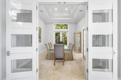 This airy custom built home sits on a half acre lot with on Old Marsh Golf Club in Florida - for sale on GolfHomes.com, golf home, golf lot