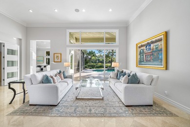 This airy custom built home sits on a half acre lot with on Old Marsh Golf Club in Florida - for sale on GolfHomes.com, golf home, golf lot