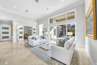 This airy custom built home sits on a half acre lot with on Old Marsh Golf Club in Florida - for sale on GolfHomes.com, golf home, golf lot