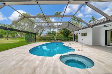 Move right into a FULLY renovated 4 bedroom 3 bath  + office on Boca Woods Country Club in Florida - for sale on GolfHomes.com, golf home, golf lot