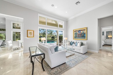 This airy custom built home sits on a half acre lot with on Old Marsh Golf Club in Florida - for sale on GolfHomes.com, golf home, golf lot