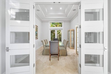 Fabulous custom home sited on a half acre lot with dramatic on Old Marsh Golf Club in Florida - for sale on GolfHomes.com, golf home, golf lot