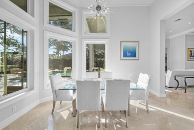 This airy custom built home sits on a half acre lot with on Old Marsh Golf Club in Florida - for sale on GolfHomes.com, golf home, golf lot