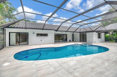 Move right into a FULLY renovated 4 bedroom 3 bath  + office on Boca Woods Country Club in Florida - for sale on GolfHomes.com, golf home, golf lot