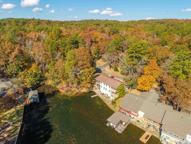 Peaceful waterfront views abound from each room in this updated on DeSoto Golf Course in Arkansas - for sale on GolfHomes.com, golf home, golf lot
