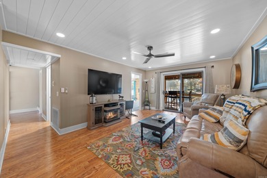 Peaceful waterfront views abound from each room in this updated on DeSoto Golf Course in Arkansas - for sale on GolfHomes.com, golf home, golf lot