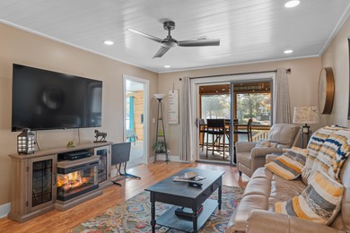 Peaceful waterfront views abound from each room in this updated on DeSoto Golf Course in Arkansas - for sale on GolfHomes.com, golf home, golf lot