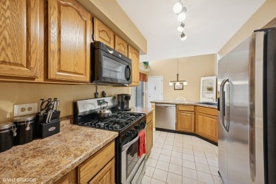Welcome Home to this well-maintained townhome in prestigious on Palatine Hills Golf Course in Illinois - for sale on GolfHomes.com, golf home, golf lot