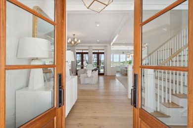 Welcome to 821 Bulls Bay Blvd, a stunning custom-built estate on Bulls Bay Golf Club in South Carolina - for sale on GolfHomes.com, golf home, golf lot