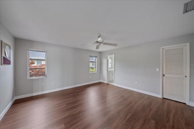 Exceptional opportunity to own this Palm Aire Country Club villa on Palm Aire Country Club of Sarasota in Florida - for sale on GolfHomes.com, golf home, golf lot