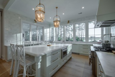 Welcome to 821 Bulls Bay Blvd, a stunning custom-built estate on Bulls Bay Golf Club in South Carolina - for sale on GolfHomes.com, golf home, golf lot