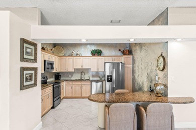 Bright and airy 2 Bedroom + Den, 2.5 Bath condo in The Polo Club on Polo Club of Boca Raton in Florida - for sale on GolfHomes.com, golf home, golf lot