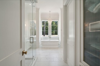 Welcome to 821 Bulls Bay Blvd, a stunning custom-built estate on Bulls Bay Golf Club in South Carolina - for sale on GolfHomes.com, golf home, golf lot