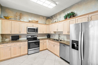 Bright and airy 2 Bedroom + Den, 2.5 Bath condo in The Polo Club on Polo Club of Boca Raton in Florida - for sale on GolfHomes.com, golf home, golf lot